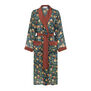 A lightweight teal-green dressing gown with terracotta coloured trim and a yellow and orange floral pattern